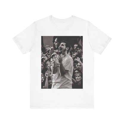 A black graphic t-shirt featuring a black and white portrait photo of Serj Tankian from System of a Down.
