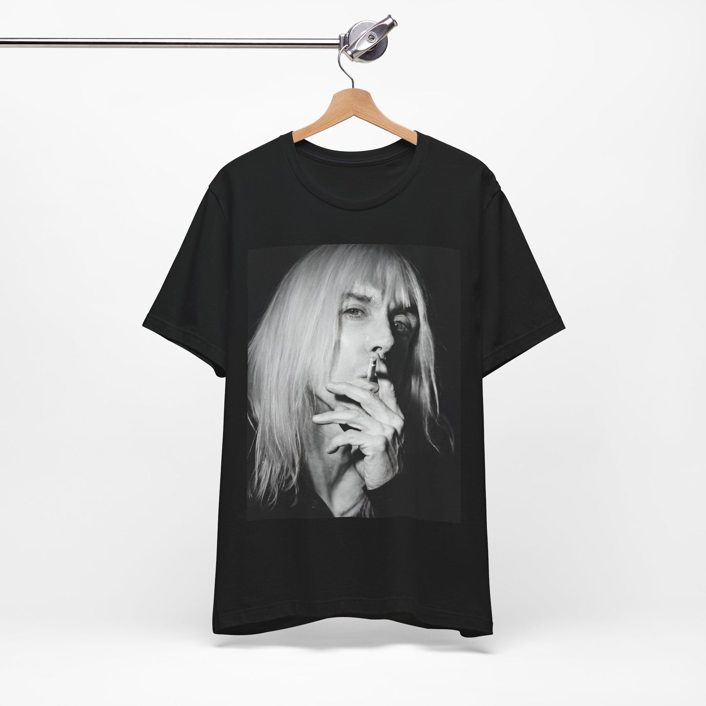 A black graphic t-shirt featuring a black and white graphic or photo of Iggy Pop holding a cigar.