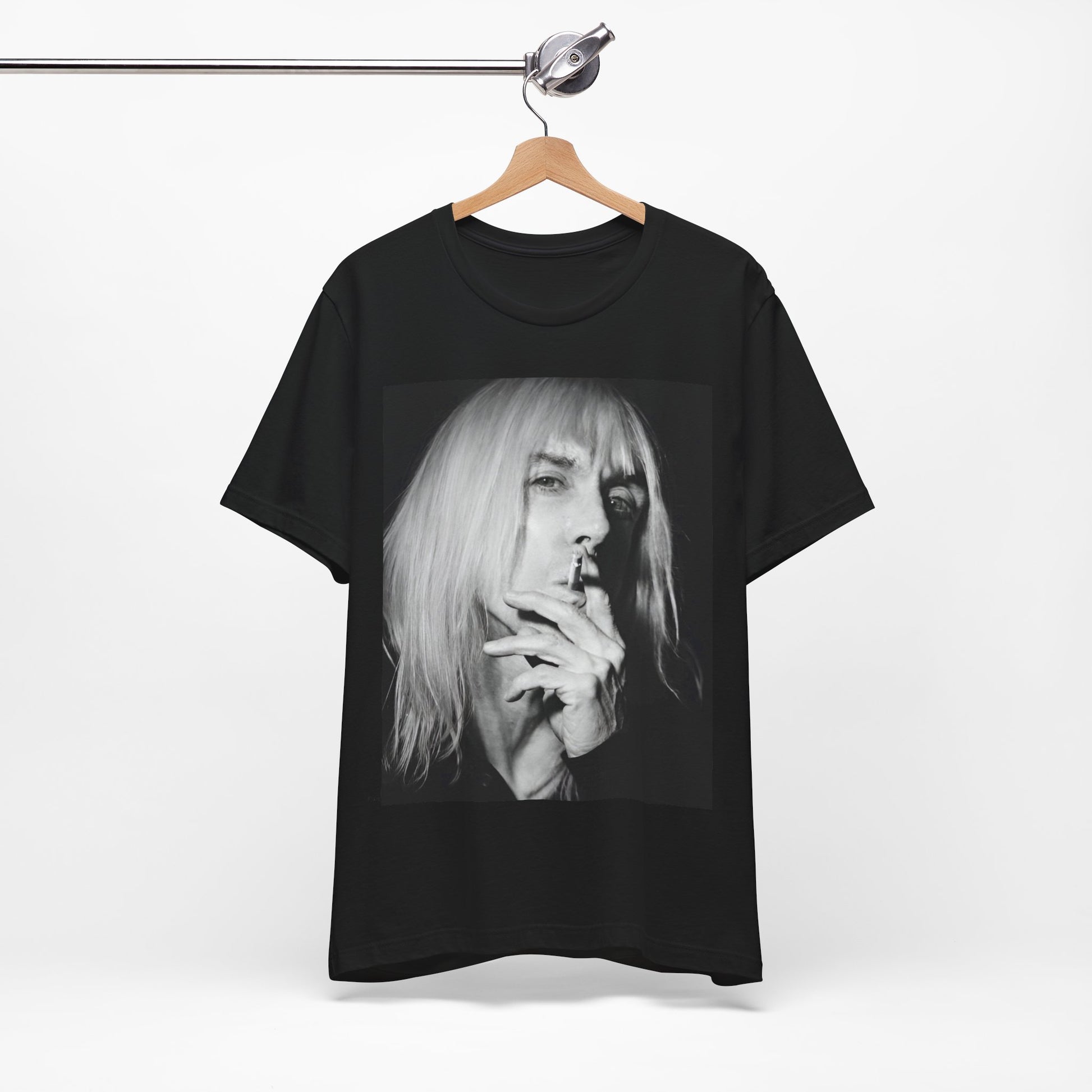 A black graphic t-shirt featuring a black and white graphic or photo of Iggy Pop holding a cigar.
