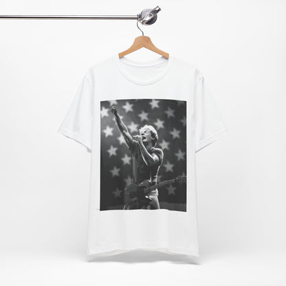 A black graphic t-shirt featuring a 70s era Americana-style graphic of Bruce Springsteen.