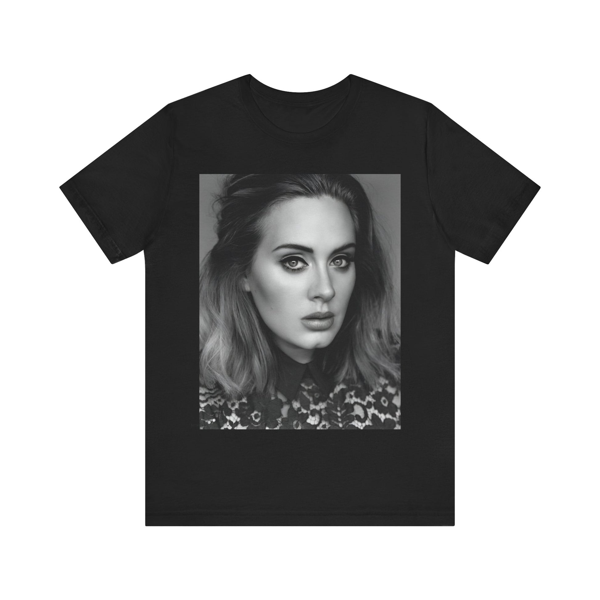 A black graphic t-shirt featuring a classic black and white, monochrome portrait of Adele, showing her with a serene or thoughtful expression.