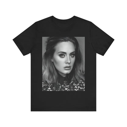 A black graphic t-shirt featuring a classic black and white, monochrome portrait of Adele, showing her with a serene or thoughtful expression.