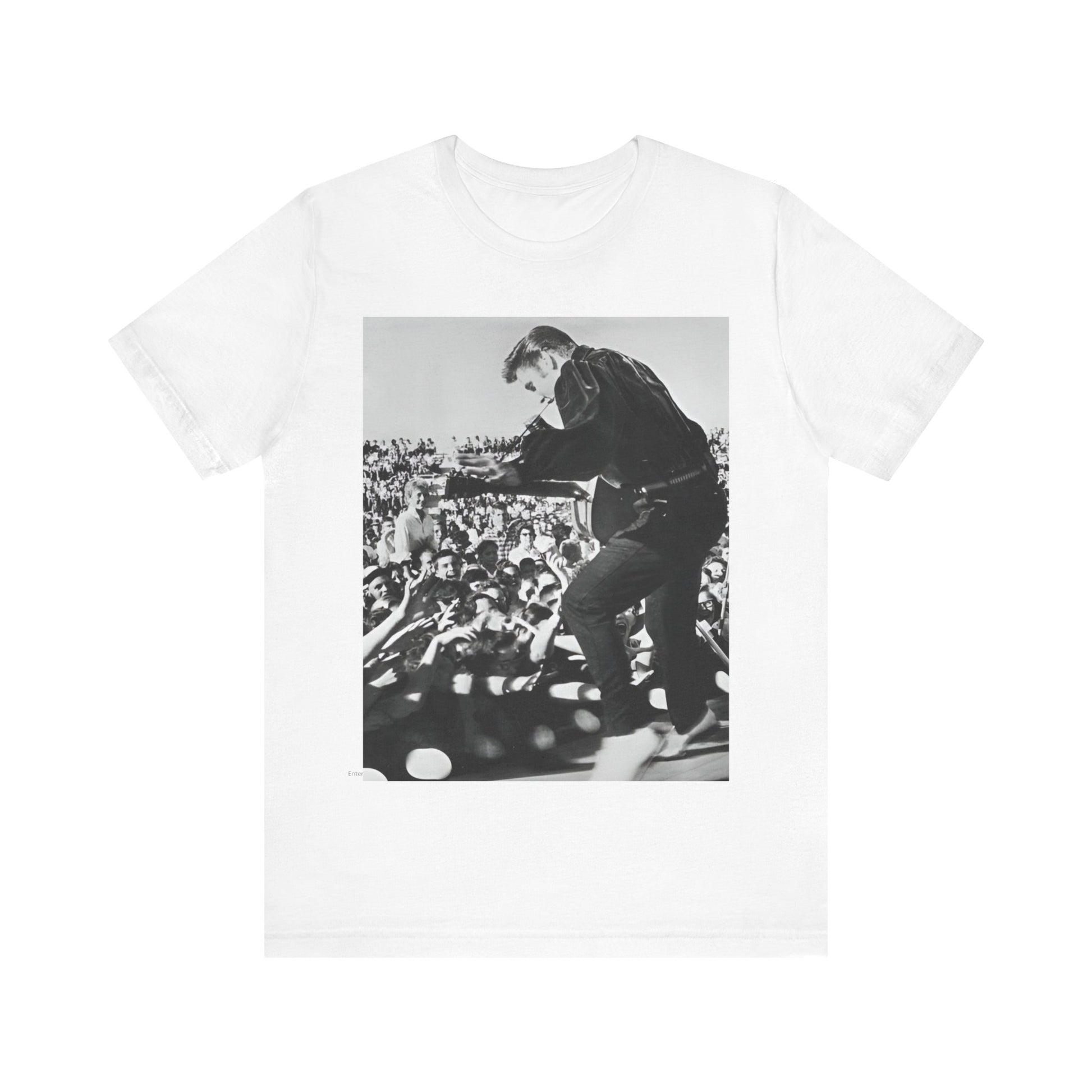 A black graphic t-shirt featuring a retro photo of Elvis Presley performing live in concert in the 1950s.