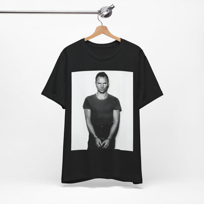 A black graphic t-shirt featuring a black and white portrait photo of Sting.