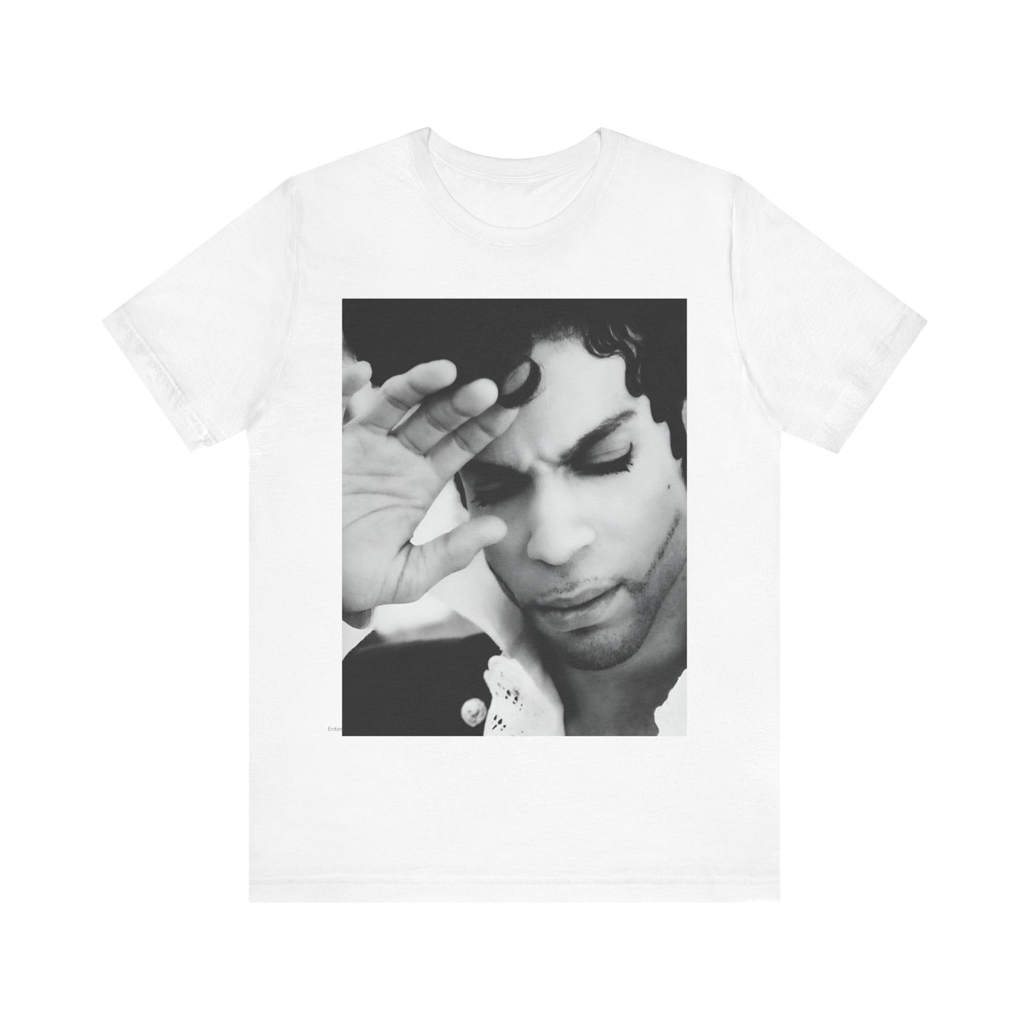 A black graphic t-shirt featuring a black and white graphic or photo portrait of Prince.