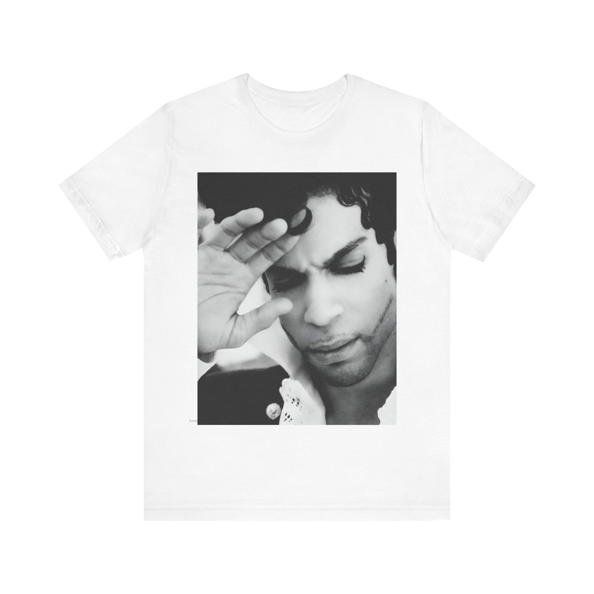 A black graphic t-shirt featuring a black and white graphic or photo portrait of Prince.