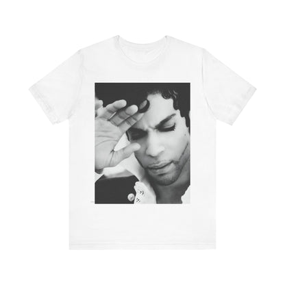 A black graphic t-shirt featuring a black and white graphic or photo portrait of Prince.