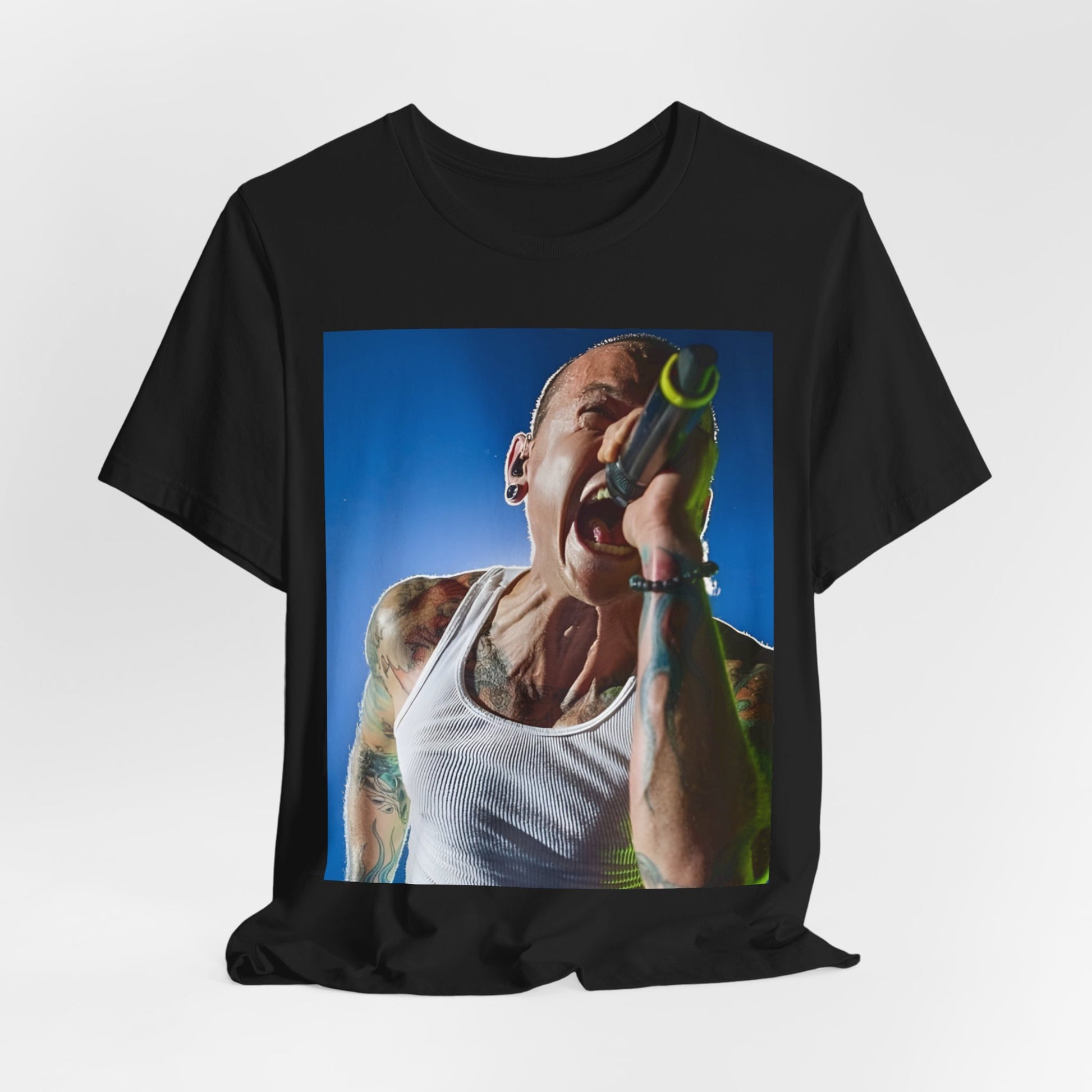 A black graphic t-shirt featuring a retro graphic of Linkin Park performing live.