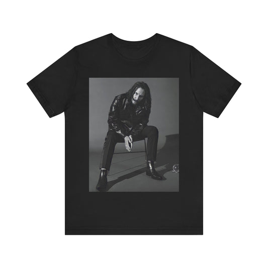A black graphic t-shirt featuring a graphic of Keanu Reeves as John Wick.