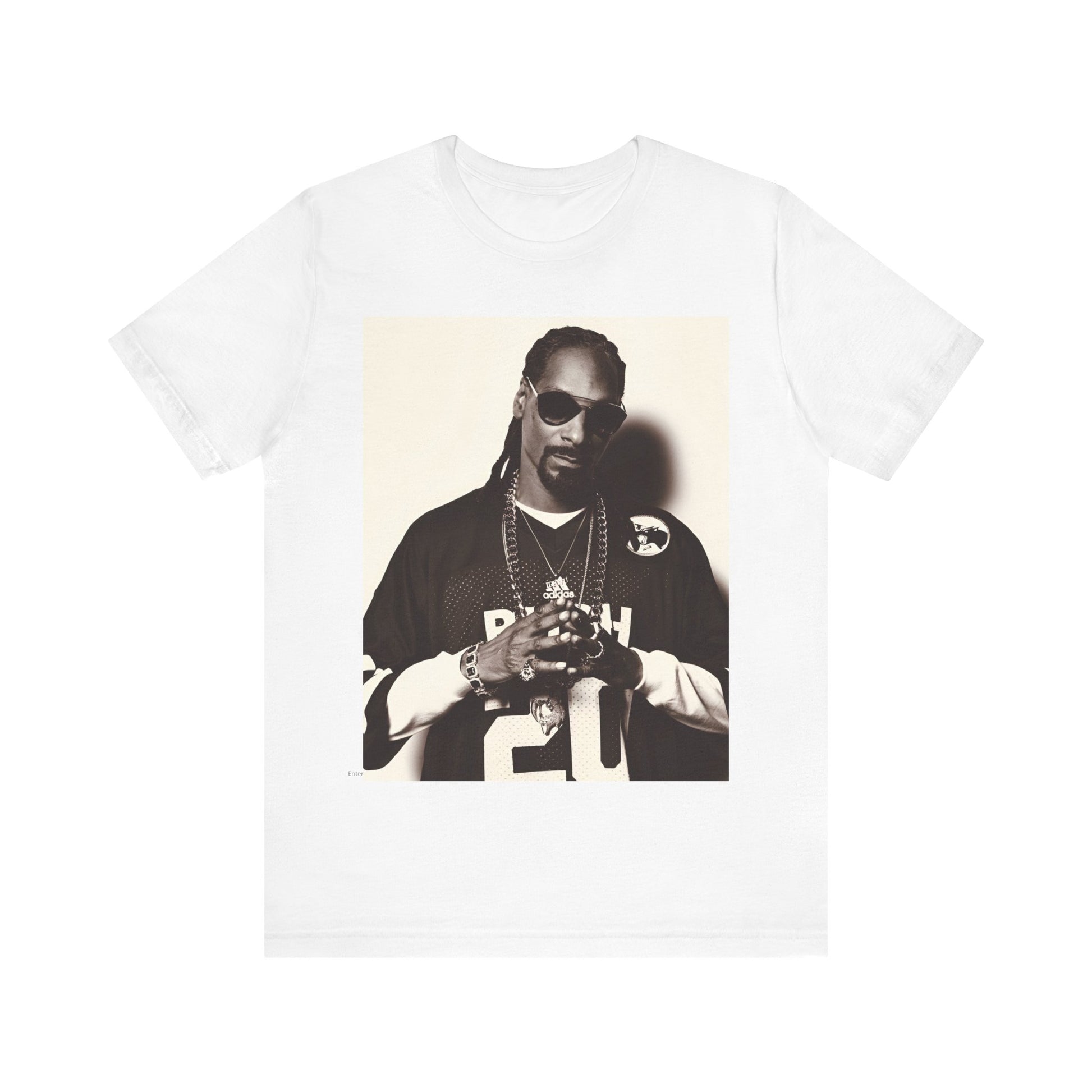 A black graphic t-shirt featuring a black and white, monochrome graphic or photo of Snoop Dogg in an OG style.