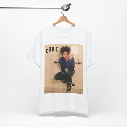 A black graphic t-shirt featuring a graphic related to The Cure's 'Friday I'm In Love' song or era.
