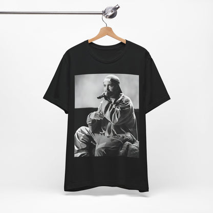 A black graphic t-shirt featuring a black and white graphic of Eminem as a 'Rap Messiah'.