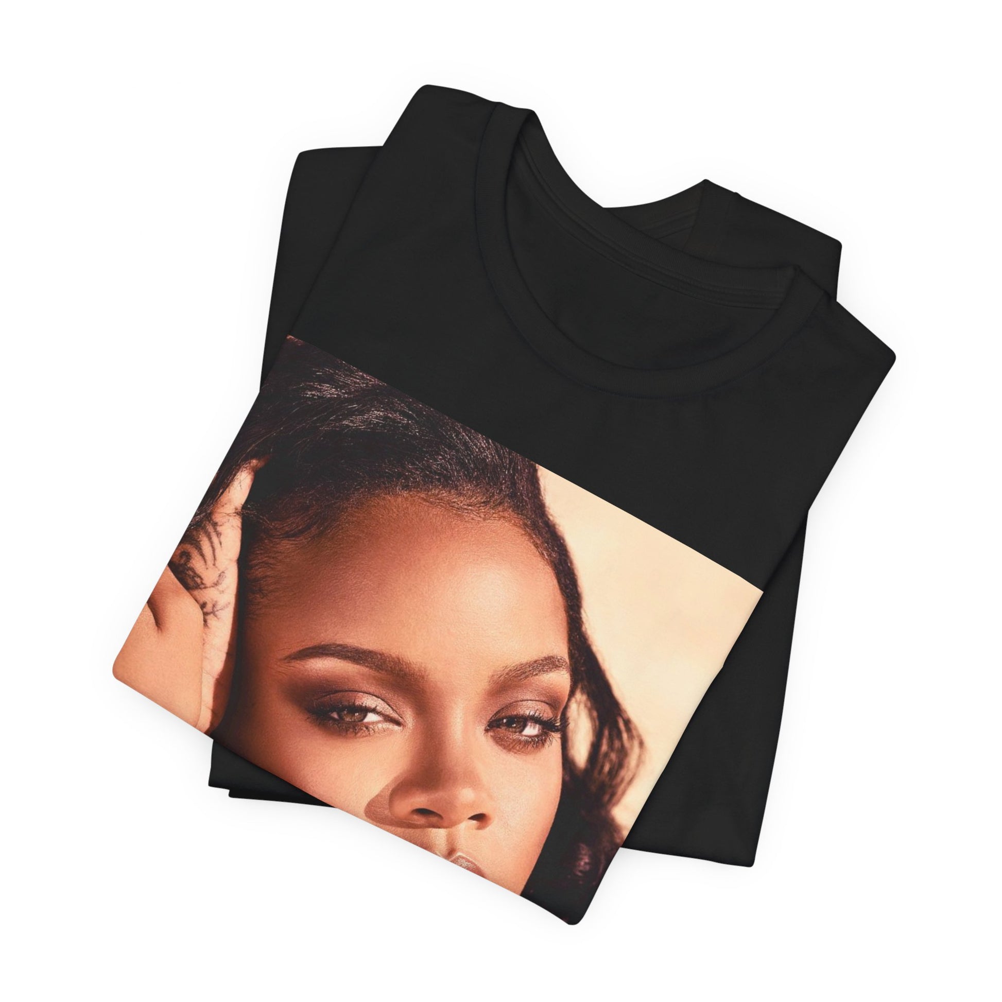 A black graphic t-shirt featuring a retro graphic related to Rihanna's 'Good Girl Gone Bad' album era.