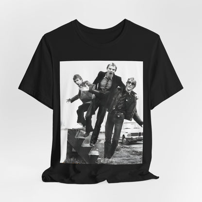 A black graphic t-shirt featuring an early days reggae rock graphic of The Police.