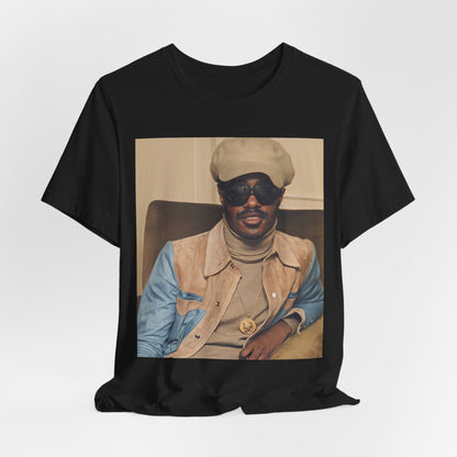 A black graphic t-shirt featuring a retro graphic related to Stevie Wonder's 'Songs in the Key of Life' album era.