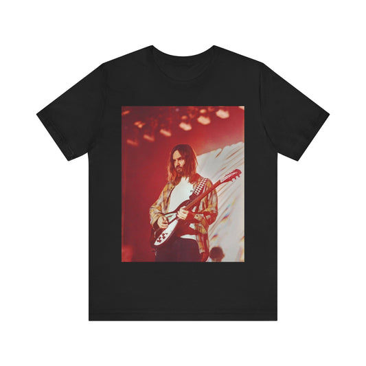 A black graphic t-shirt featuring a cool psychedelic journey graphic of Tame Impala.