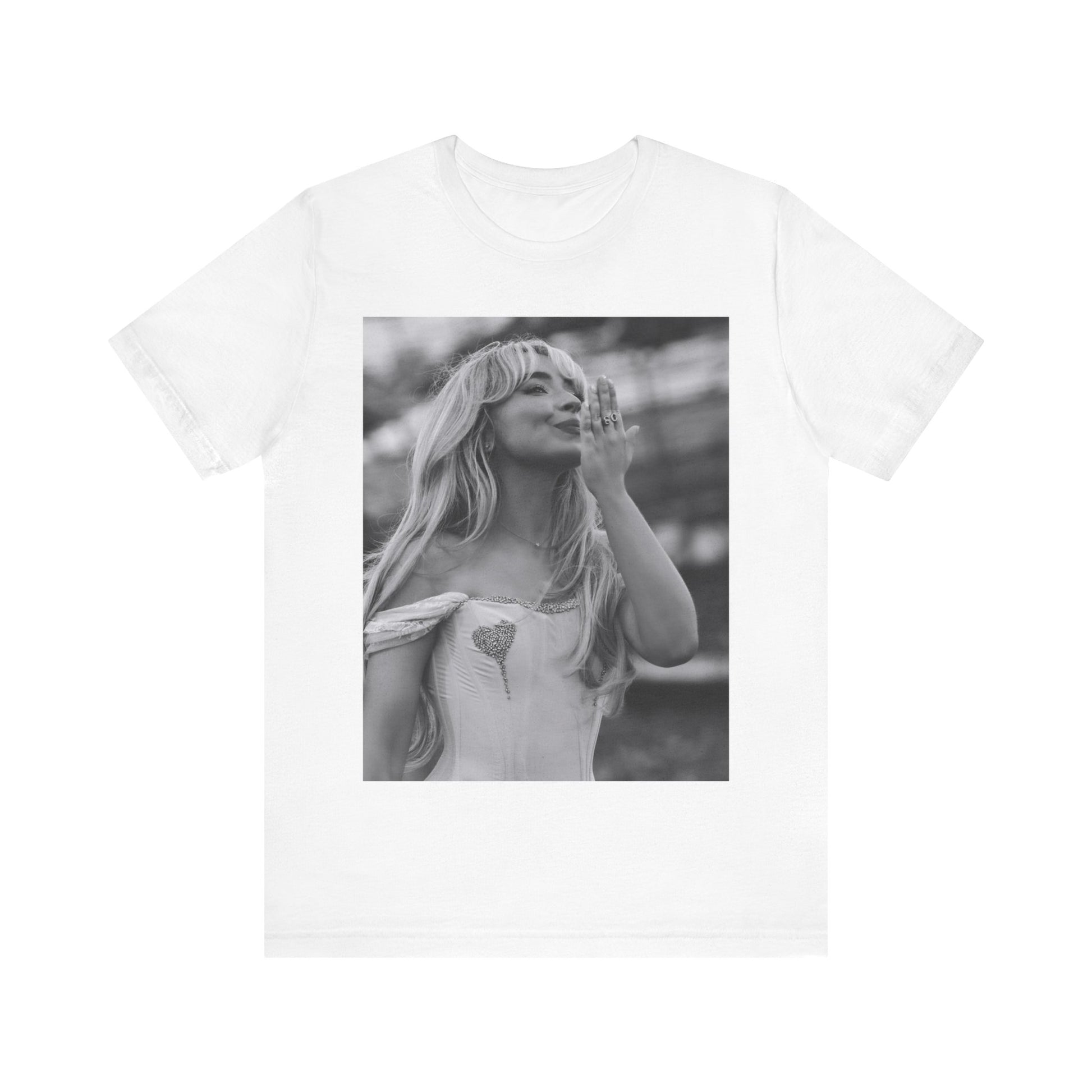A black graphic t-shirt featuring a graphic or photo of Sabrina Carpenter kissing on stage during a performance.