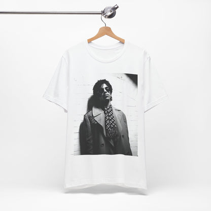 A black graphic t-shirt featuring Prince's iconic symbol, representing 'The Artist Formerly Known As'.