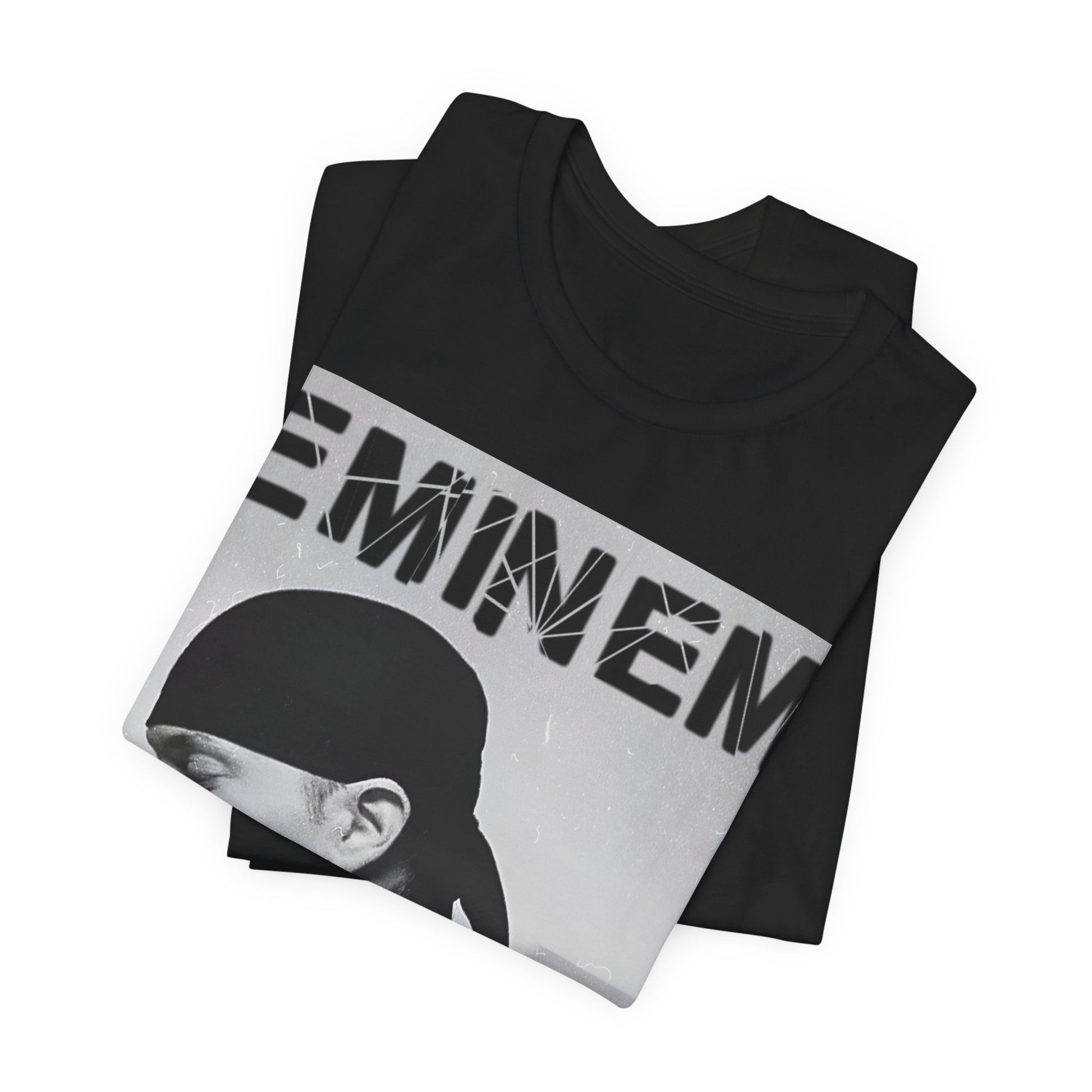 A black graphic t-shirt featuring a stylized graphic of Eminem as a modern rap legend.
