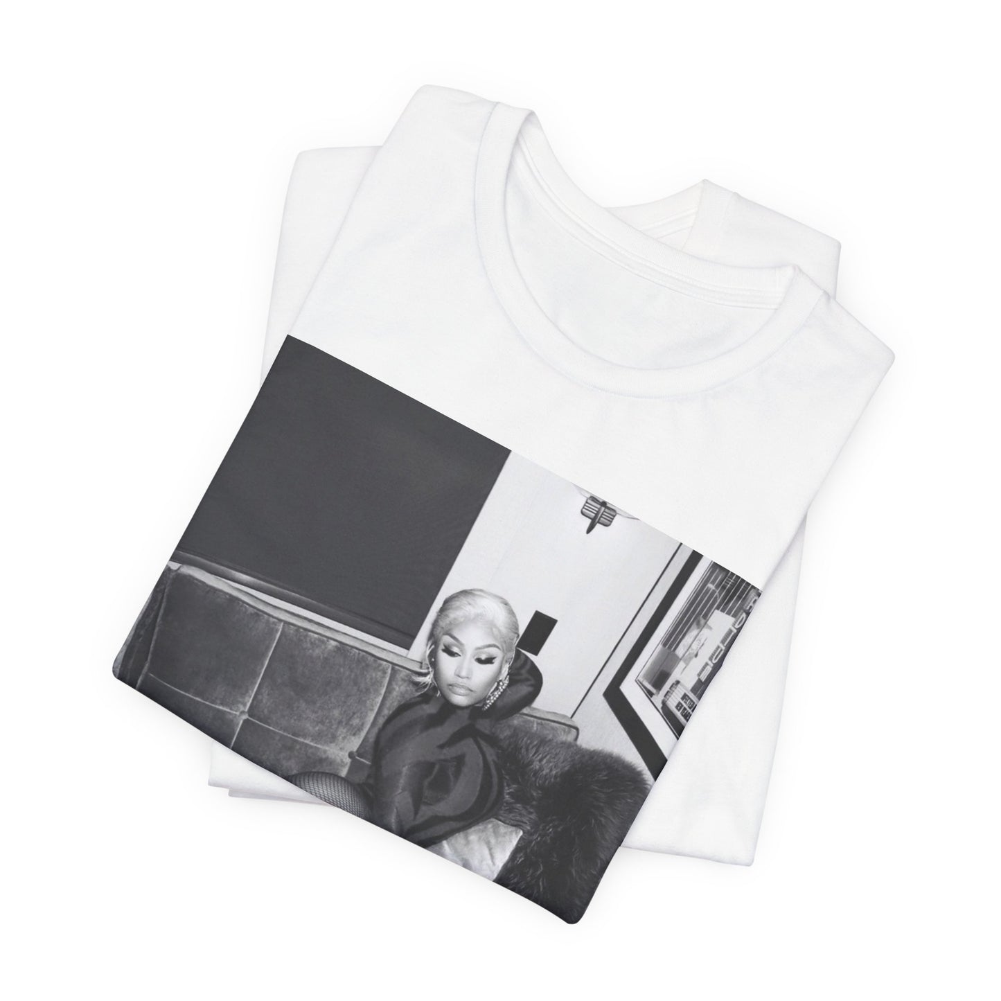 A black graphic t-shirt featuring a fierce black and white glamour graphic of Nicki Minaj.