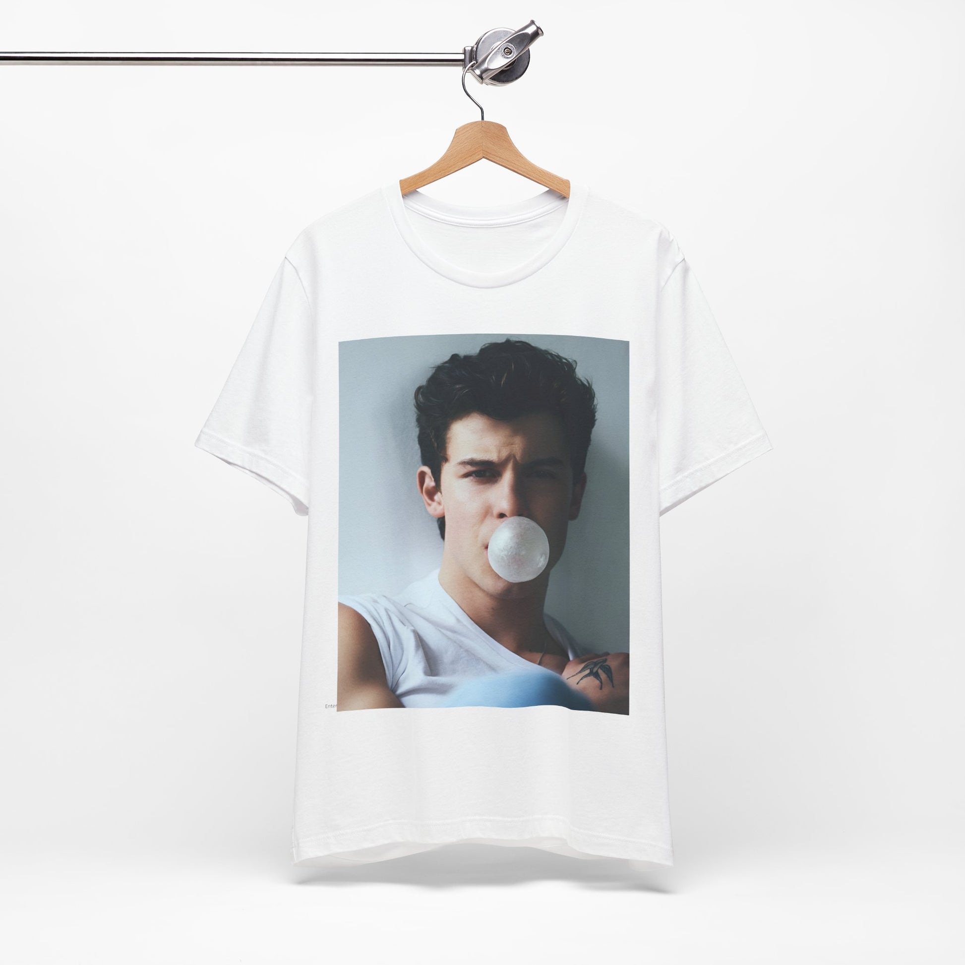 A black graphic t-shirt featuring a photo of Shawn Mendes with a fierce, confident gaze.