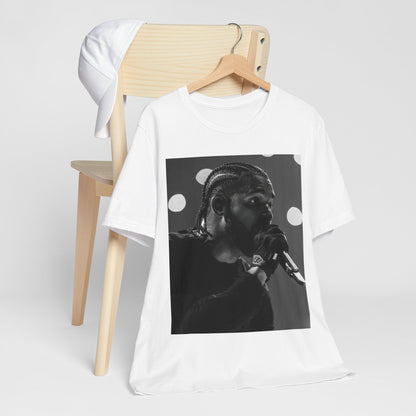 A black graphic t-shirt featuring a classic black and white style graphic of Drake.