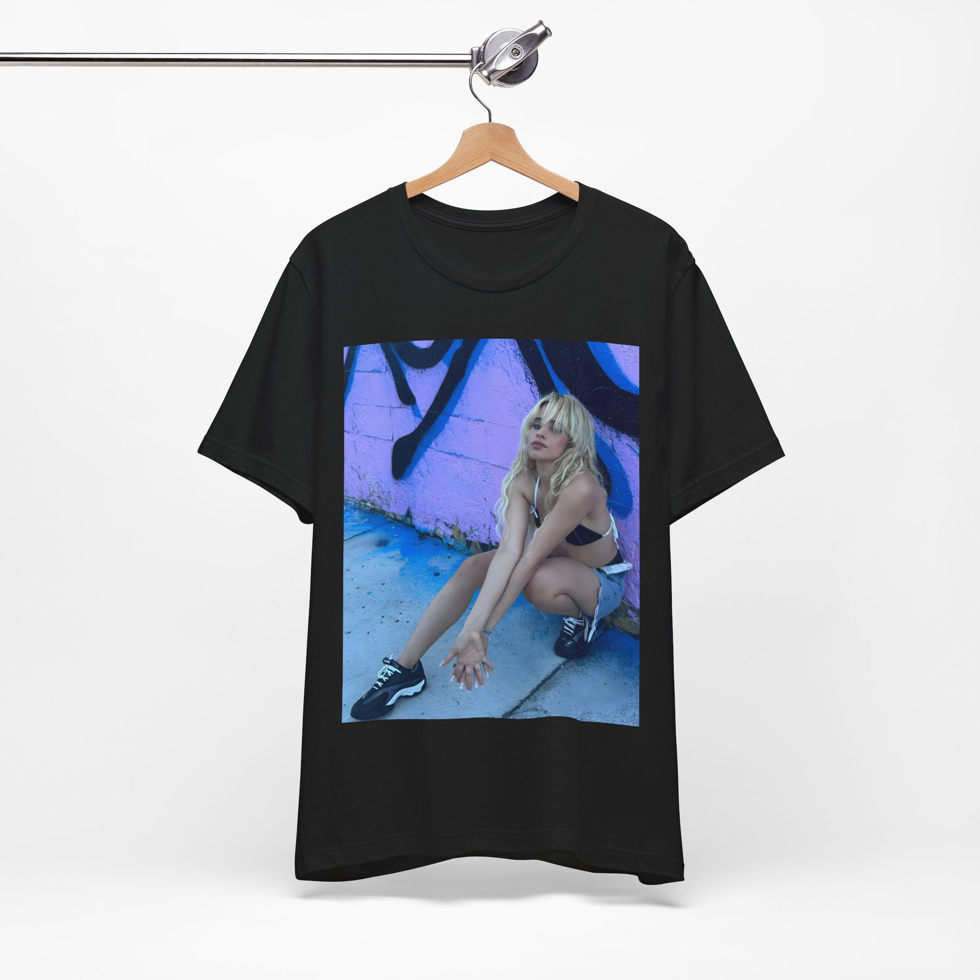 A black graphic t-shirt featuring a photo of Camila Cabello from her "Romance" album era.