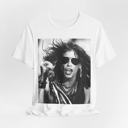 A black graphic t-shirt featuring a black and white photo of Aerosmith's Steven Tyler with his signature scarf and microphone, captured during a dynamic performance.