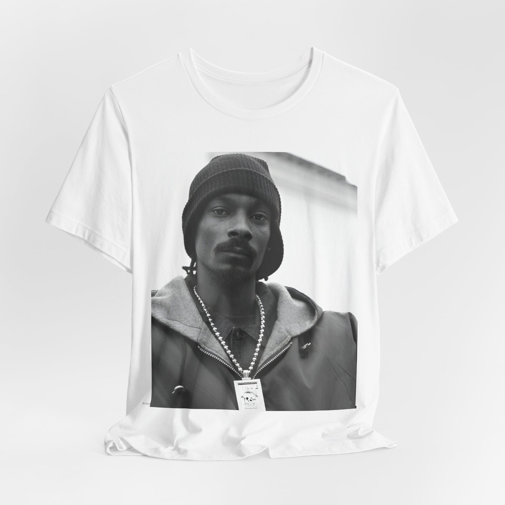 A black graphic t-shirt featuring a black and white, monochrome graphic of Snoop Dogg with an OG cool vibe.