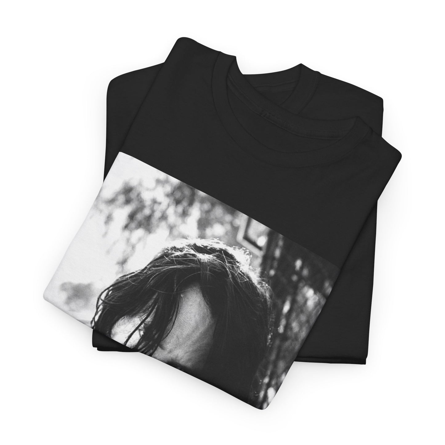A black graphic t-shirt featuring a graphic of Keanu Reeves with authentic chill vibes.