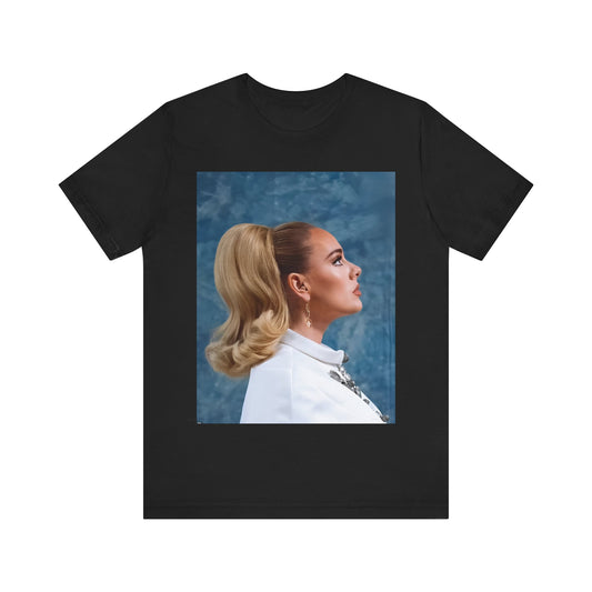 A black graphic t-shirt featuring a black and white photo of Adele in a vintage glamorous look, with classic hair and makeup.