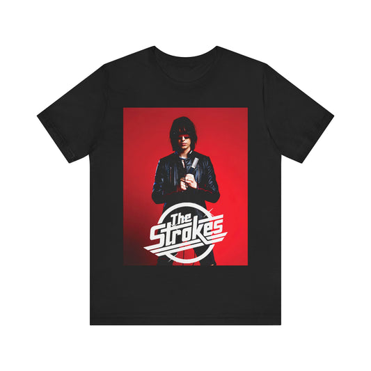 A black graphic t-shirt featuring a bold indie rock superstar graphic of The Strokes.