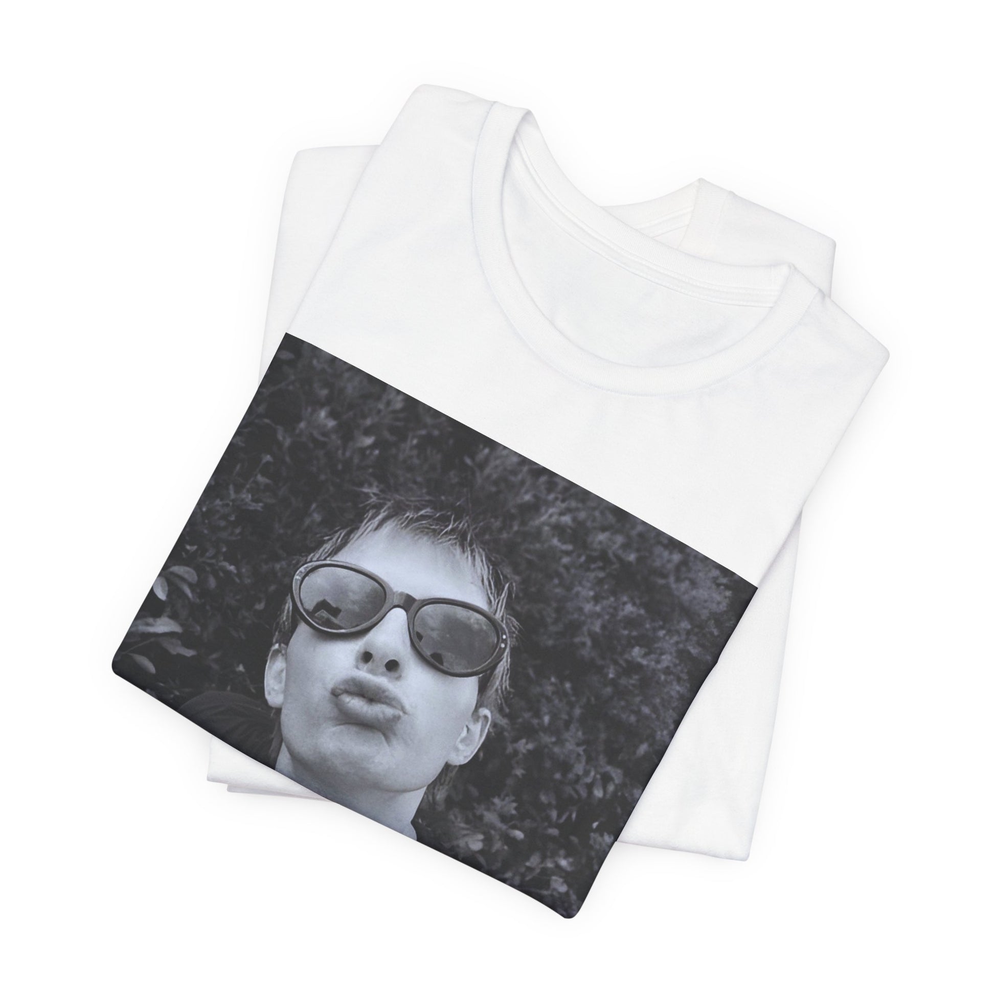 A black graphic t-shirt featuring a retro 90s graphic of Thom Yorke from Radiohead.