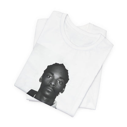 A black graphic t-shirt featuring a graphic of Snoop Dogg's mug shot.
