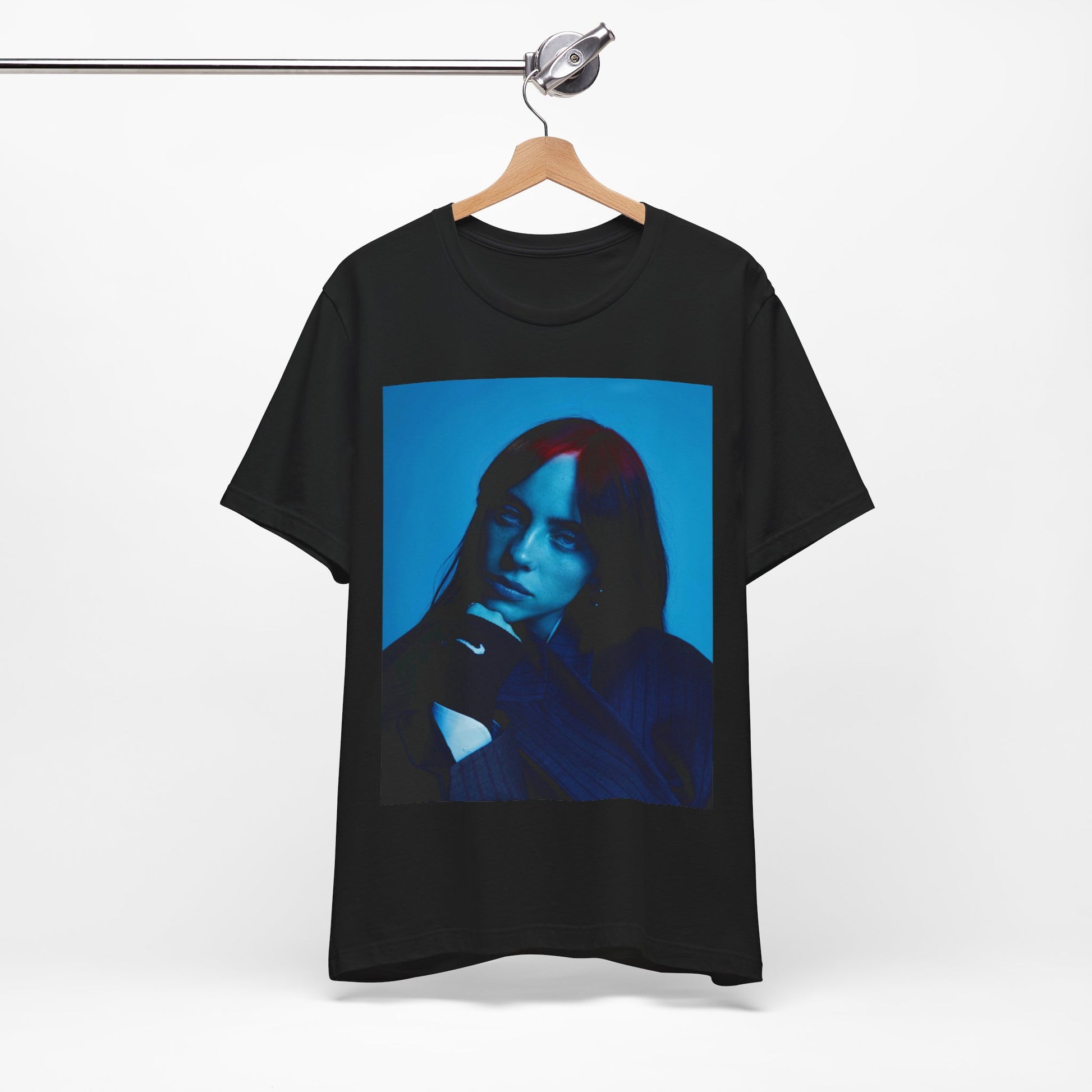 A soft, slightly blurred photo of Billie Eilish, evoking the dreamy and nostalgic feel of her song 'Ocean Eyes,' printed on a t-shirt.