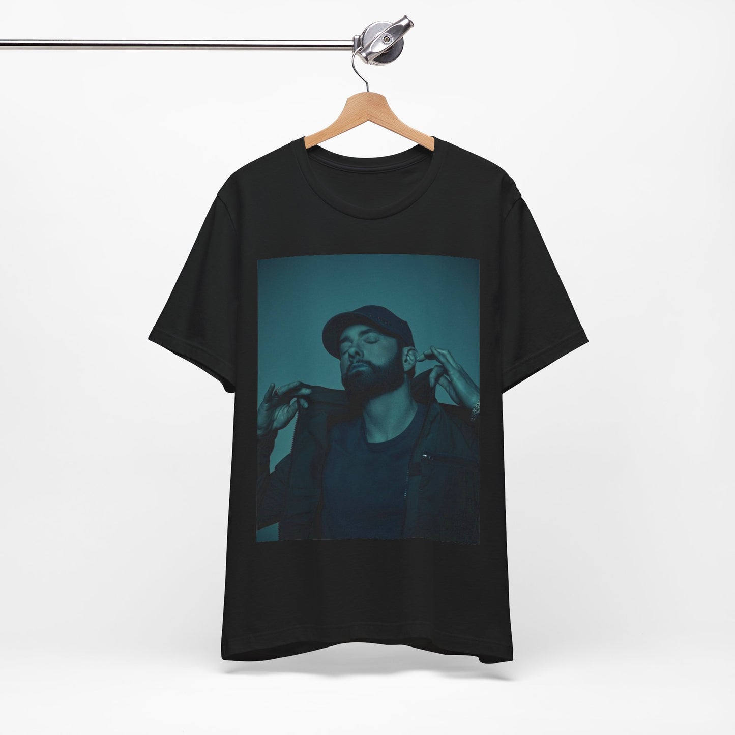 A black graphic t-shirt featuring a graphic of Eminem as a 'Rap God'.
