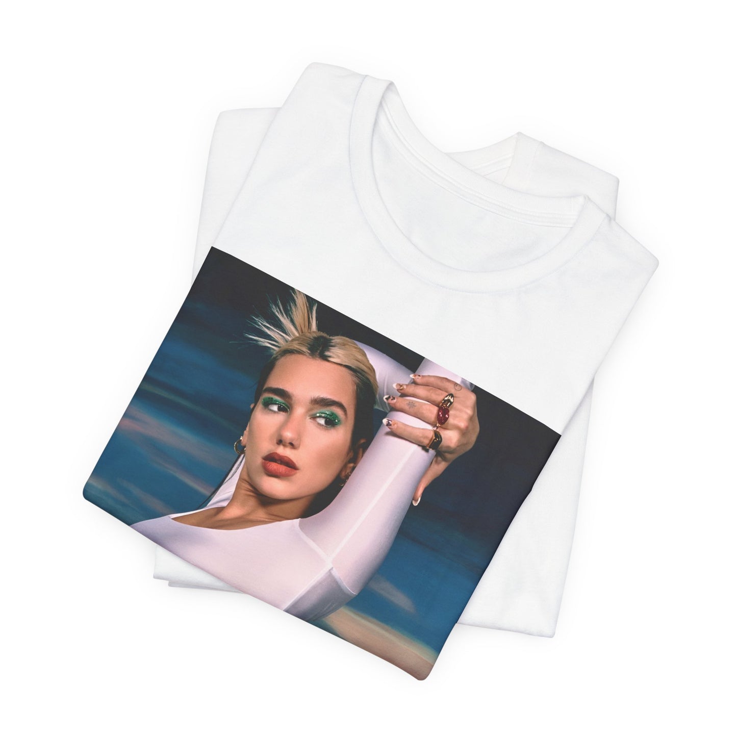 A black graphic t-shirt featuring a stylized graphic of Dua Lipa as a modern pop sensation.