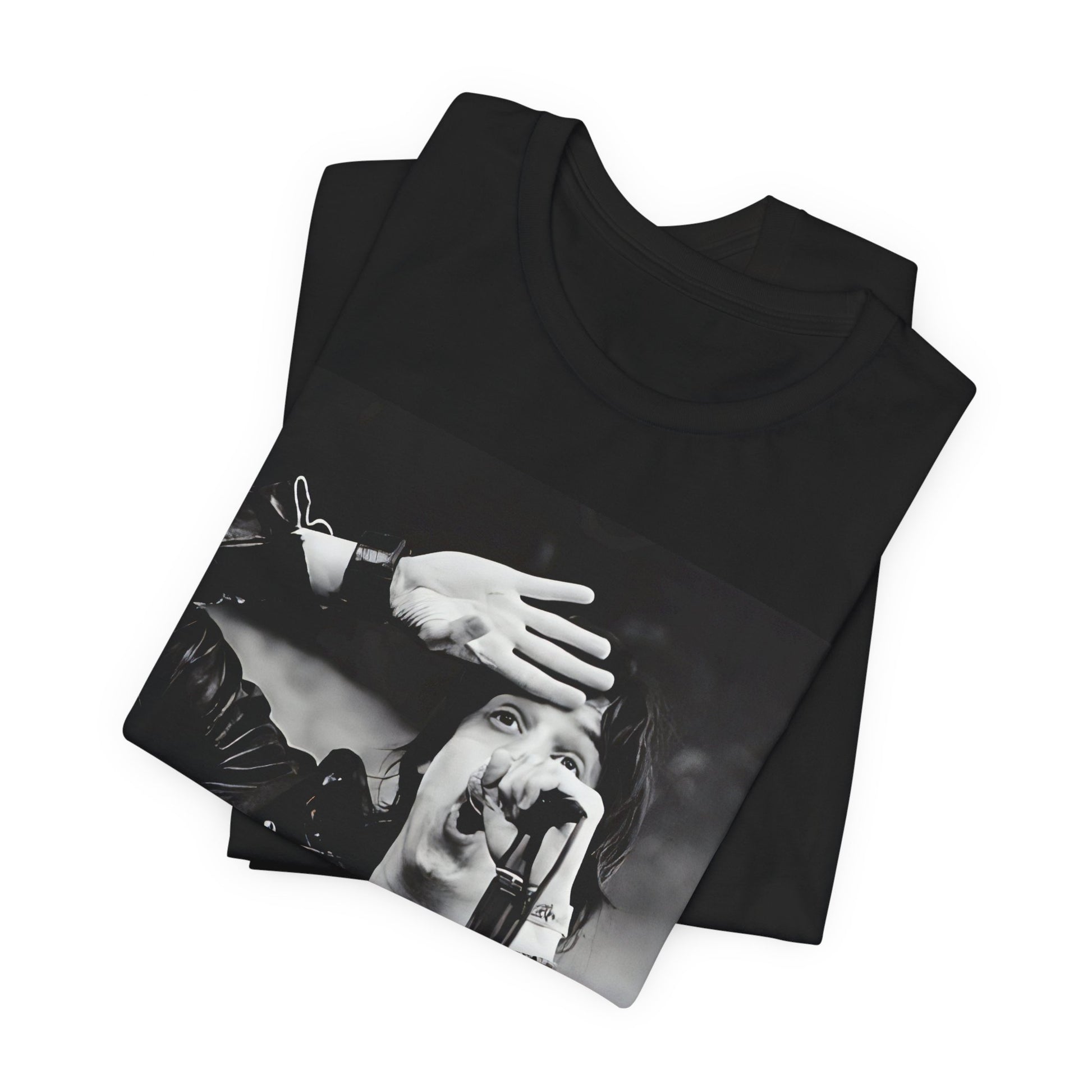 A black graphic t-shirt featuring a black and white portrait photo of The Strokes band.