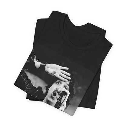 A black graphic t-shirt featuring a black and white portrait photo of The Strokes band.