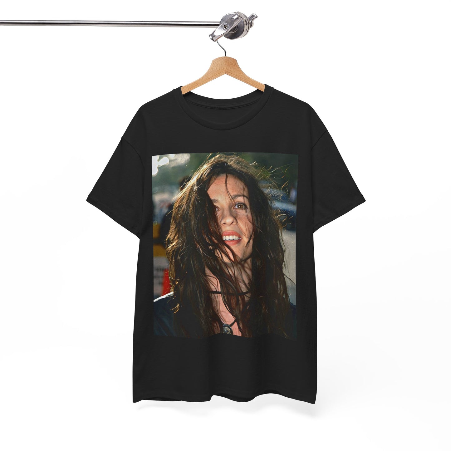 A black graphic t-shirt featuring a stylized graphic of Alanis Morissette from her 90s grunge era, with a raw and intense aesthetic.