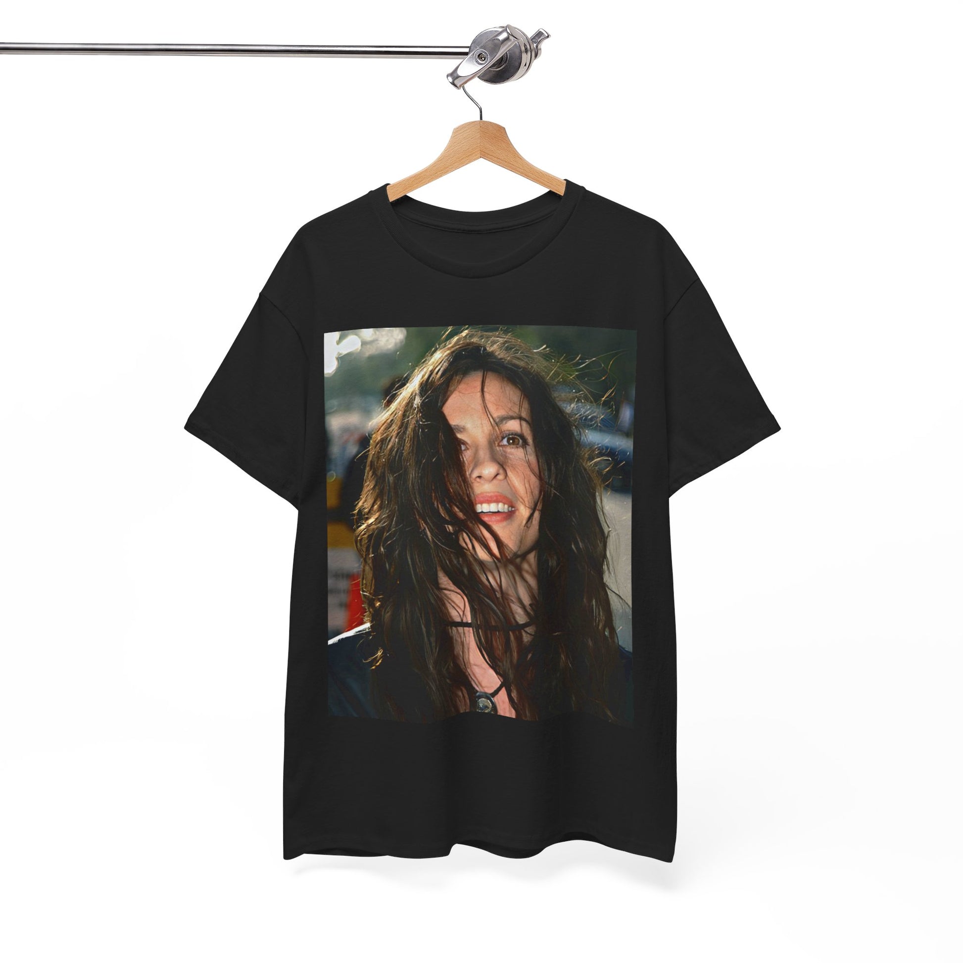 A black graphic t-shirt featuring a stylized graphic of Alanis Morissette from her 90s grunge era, with a raw and intense aesthetic.