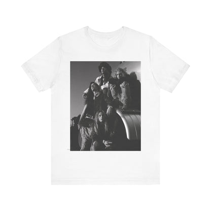A black graphic t-shirt featuring a 90s black and white photographic portrait of the band Alice In Chains, capturing their iconic grunge look.