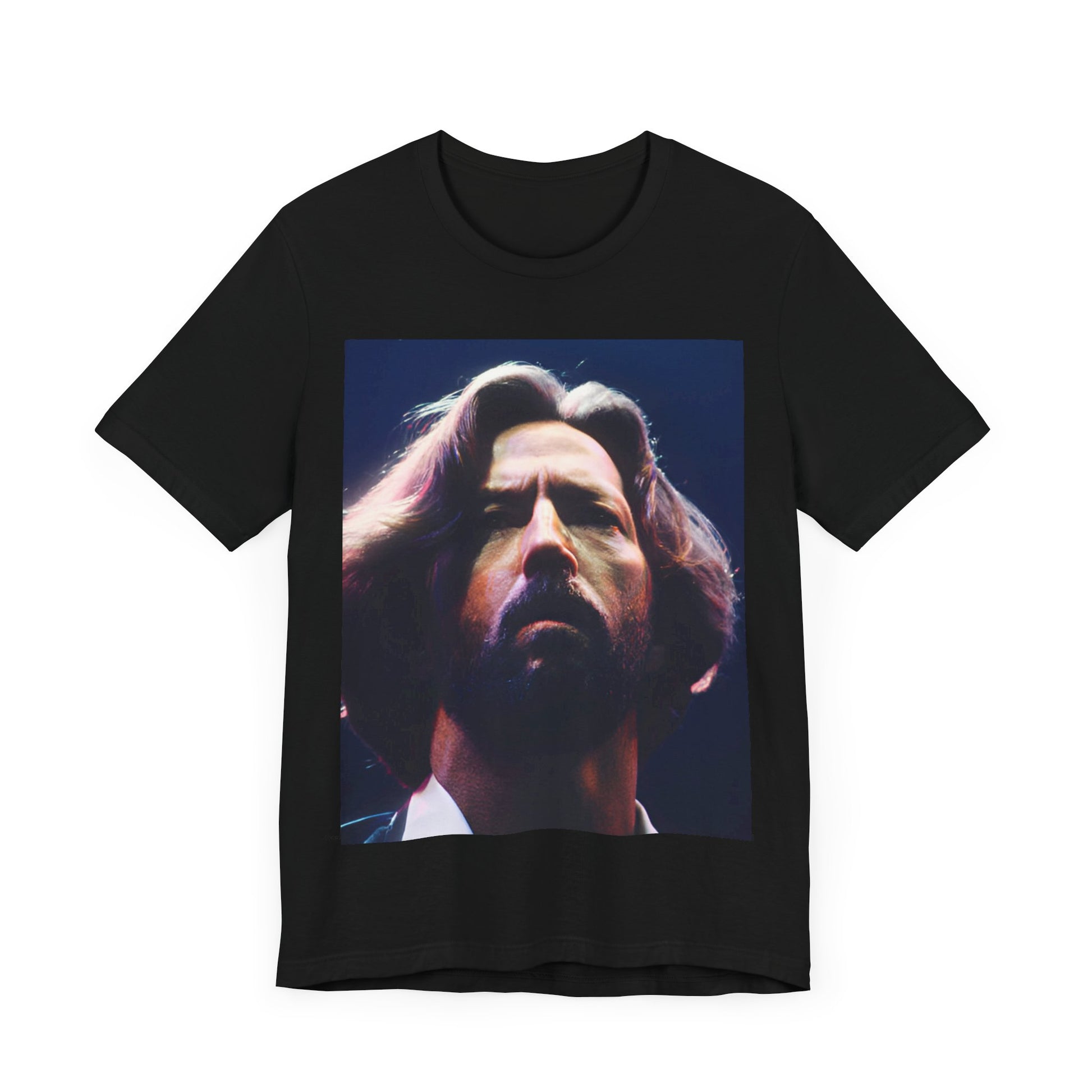A black graphic t-shirt featuring a graphic related to Eric Clapton's 'Tears in Heaven' song or era.