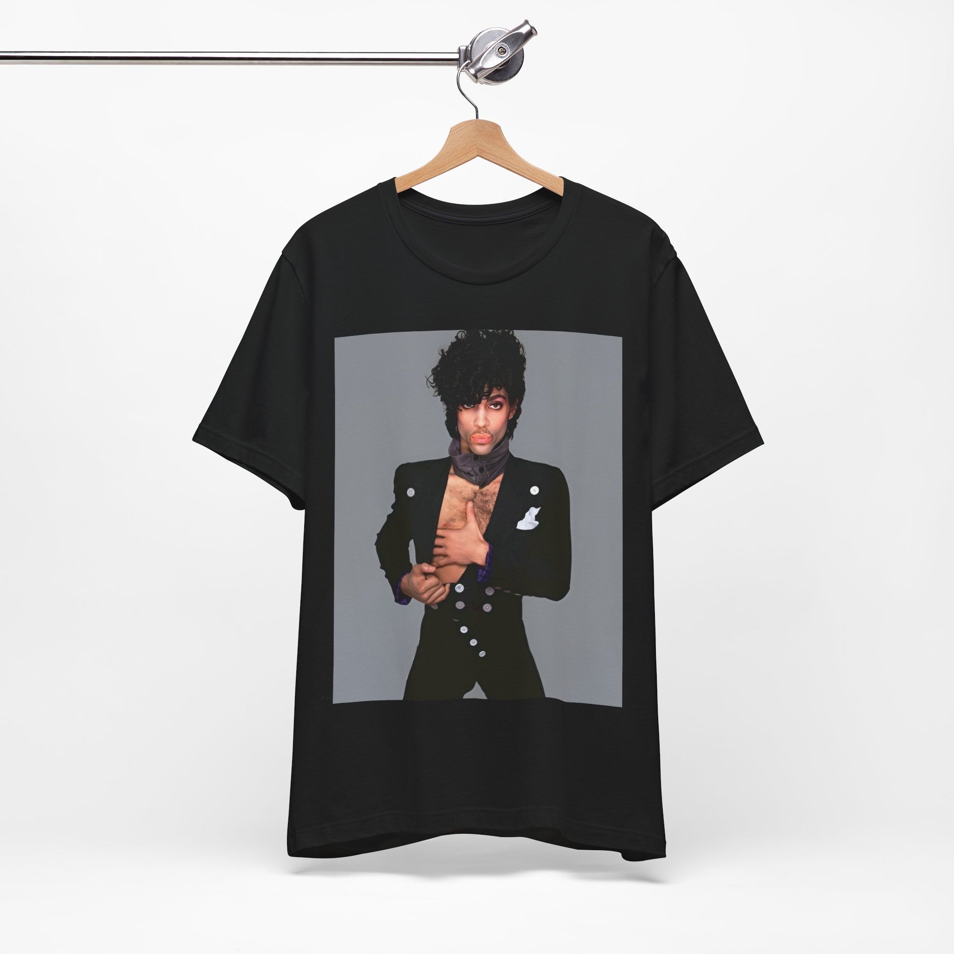 A black graphic t-shirt featuring a 90s vintage funk pop icon graphic of Prince.