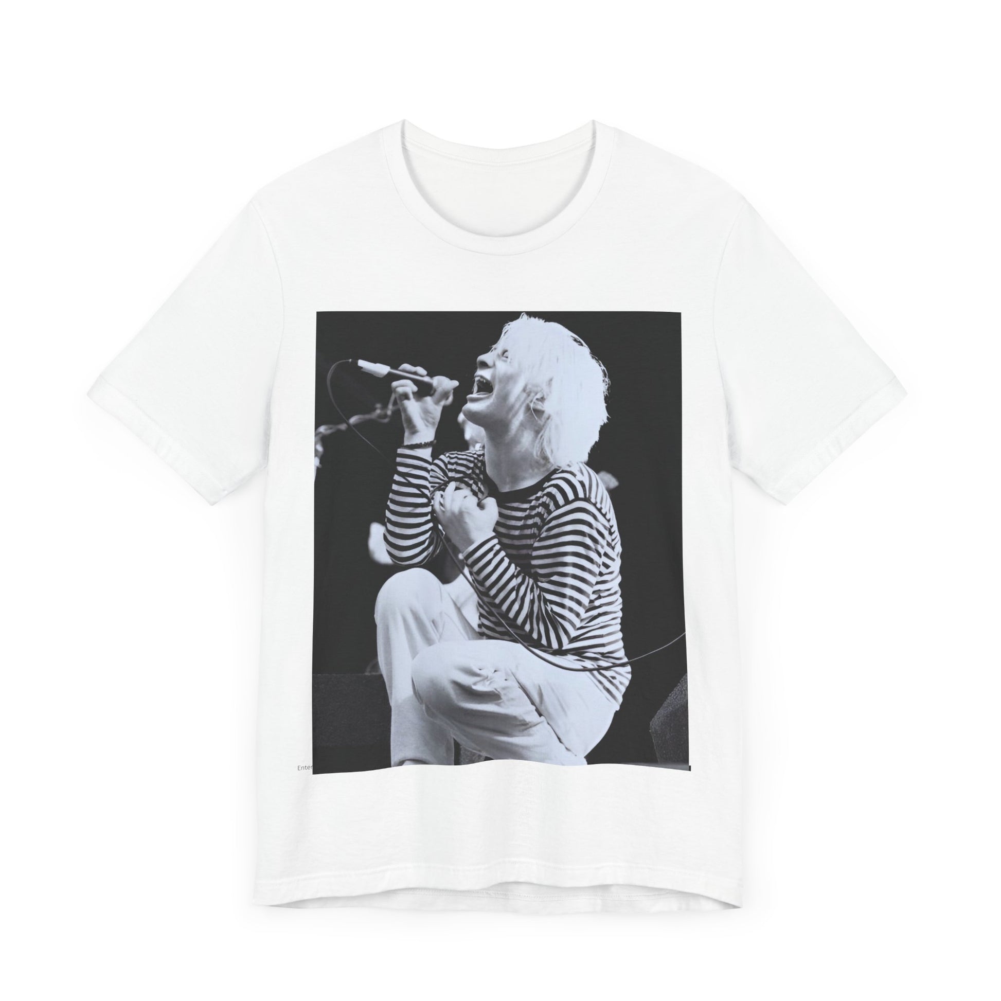 A black graphic t-shirt featuring a black and white graphic or photo of Radiohead performing live.