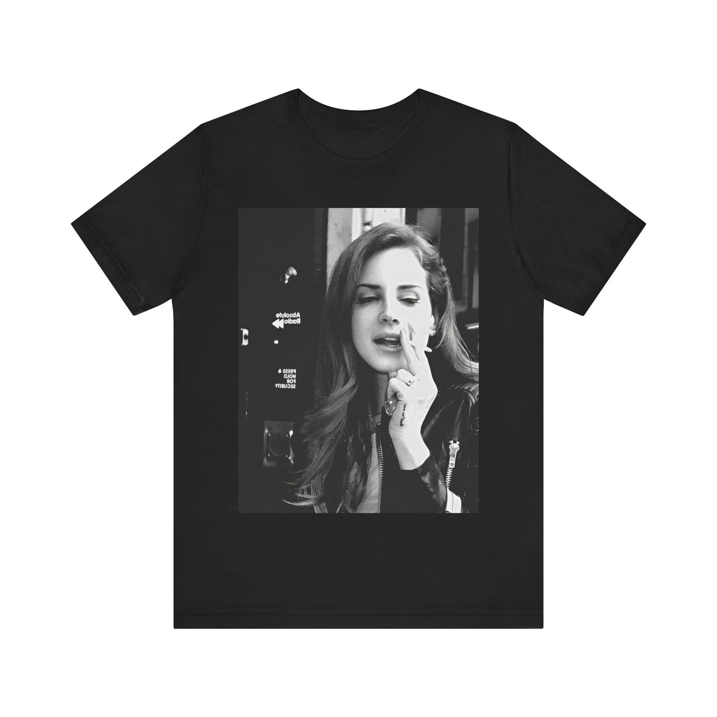 Candid, black and white street-style photo of Lana Del Rey in a leather jacket smoking a cigarette, printed on a t-shirt.