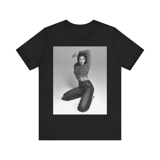 A black graphic t-shirt featuring a black and white photo of Dua Lipa in a posed manner.