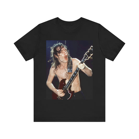 A graphic of AC/DC's lead guitarist, Angus Young, performing with high energy live on stage, printed on a t-shirt.