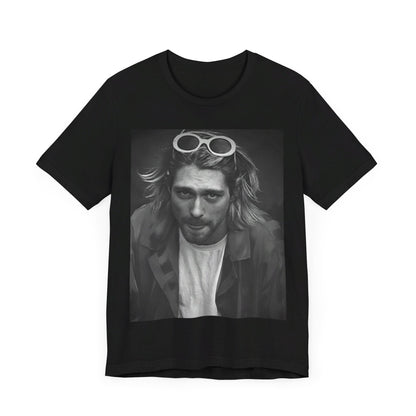 A black graphic t-shirt featuring a photo of Kurt Cobain from Nirvana wearing sunglasses.