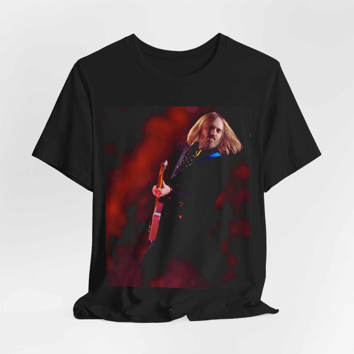 A black graphic t-shirt featuring a graphic or photo of Tom Petty as a powerhouse live performer.